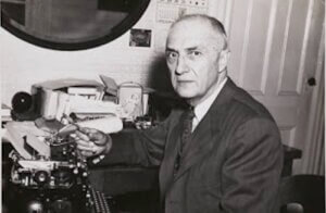 Photo de William Carlos Williams, probablement à la fin des années 1950, à son bureau